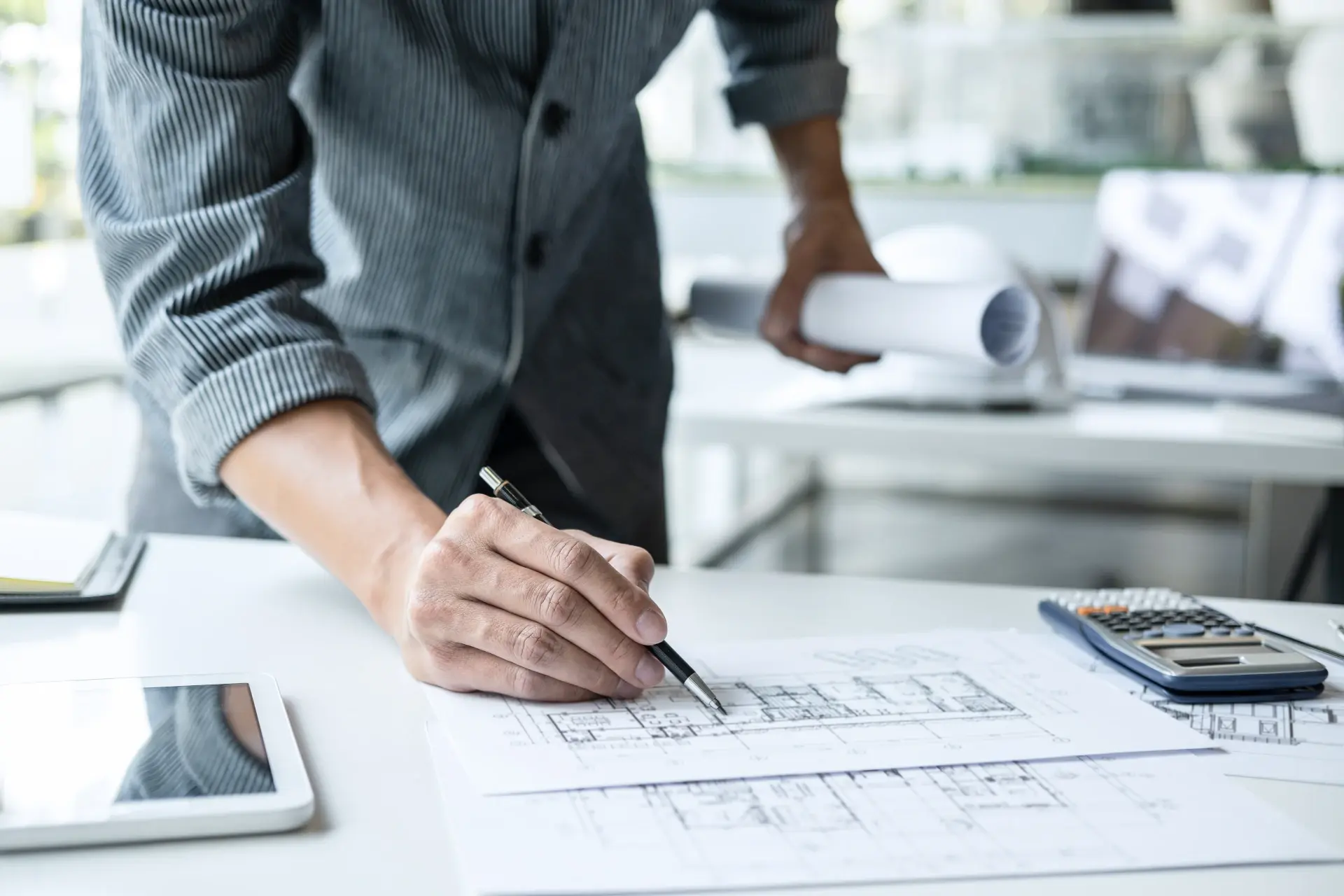 architect-working-on-blueprint-2021-08-31-13-26-43-utc